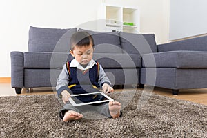 Asian baby boy using tablet