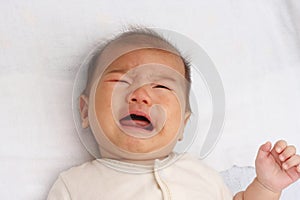 Asian baby crying