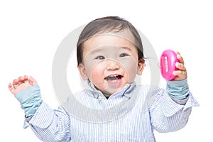 Asian baby feeling excited