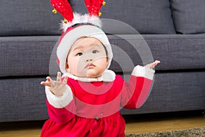 Asian baby girl with christmas dressing