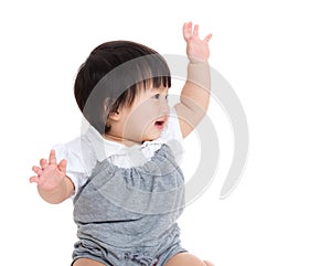 Asian baby girl greeting with hand up