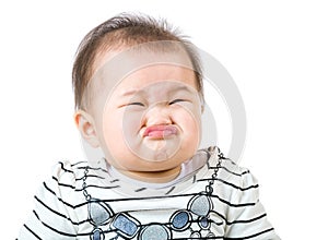 Asian baby girl make upset face