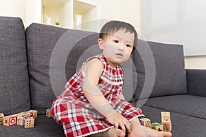 Asian baby girl play with toy block