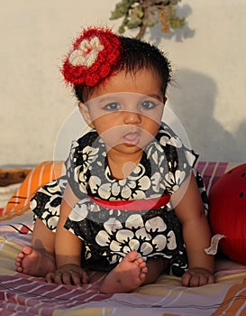 Asian baby girl with strange expression