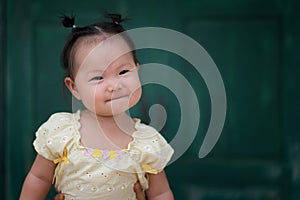 Asian baby girl with Thai traditional dress.