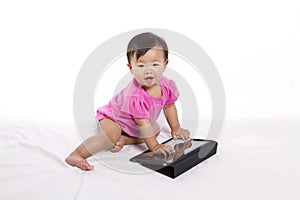 Asian baby with ipad