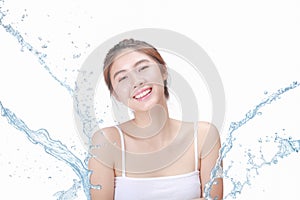 Asian Beautiful model. Beautiful Smiling girl under splash of water with fresh skin on white background