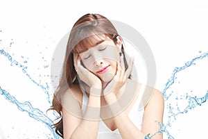 Asian Beautiful model. Beautiful Smiling girl under splash of water with fresh skin on white background