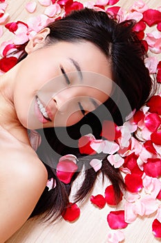 Asian beauty Girl smiling close-up with rose