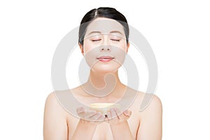 Asian beauty woman display presenting facial product