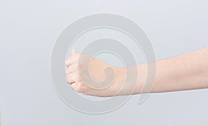 Asian beauty woman fist hand isolated on gray background