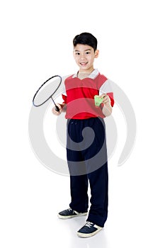 Asian boy in badminton action