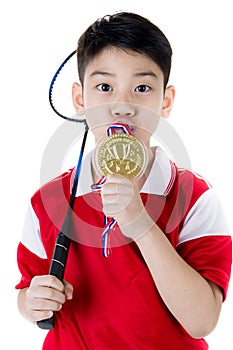 Asian boy in badminton action