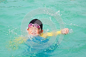 Asian boy drowning in the pool