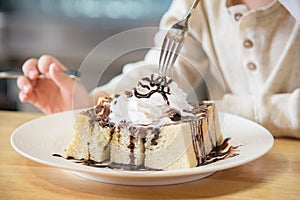 Asian boy eating honey toast