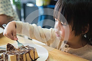 Asian boy eating honey toast