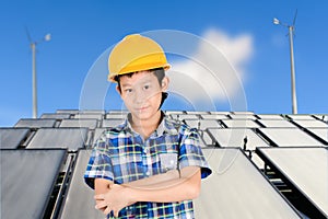 Asian boy with Group of Solar panel system