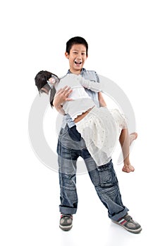 Asian boy holding his sister in his hand