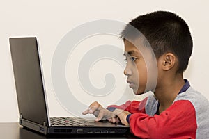 Asian Boy with Laptop