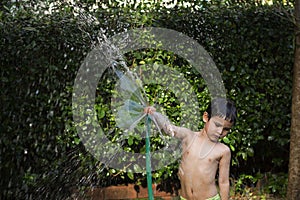 Asian boy played water