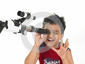 Asian boy with telescope