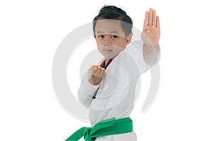 Asian boy wearing white Taekwondo suit acting ready to battle, I