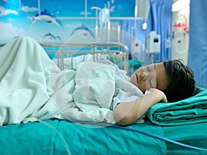 An Asian boy who is ill with Adenoid disease