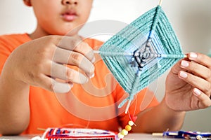 Asian boys make handmade inventions