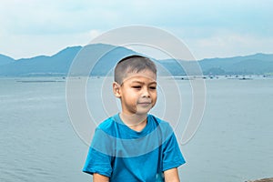 Asian boys and mountain views in Krasiew dam , Supanburi.