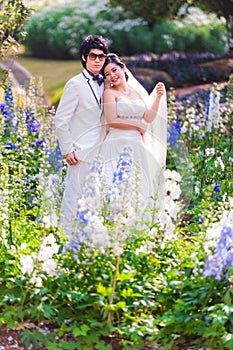 Asian Bride and Groom on Natural Background