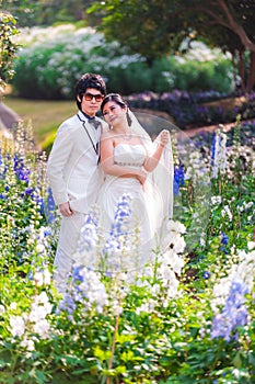 Asian Bride and Groom on Natural Background