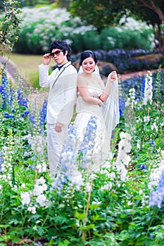 Asian Bride and Groom on Natural Background