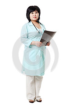 Asian brunette nurse with stethoscope around neck and the x-ray picture of human skull in her hands, provides diagnosis