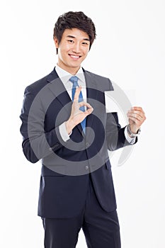 Asian business man with blank card.