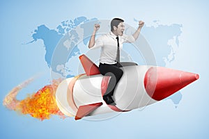 Asian business man flying ride rocket