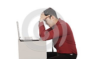 Asian business man stress working with laptop