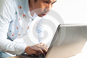 Asian business man using laptop, Smart life concept