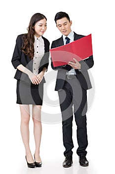 Asian business man and woman discussing