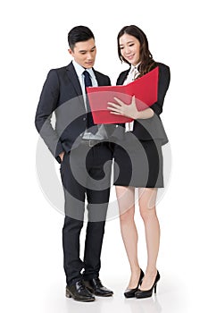 Asian business man and woman discussing