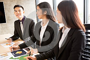 Asian business people in meeting