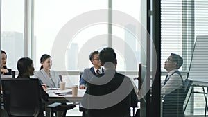 Asian business people meeting in conference room