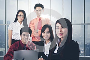 Asian business people in a modern office