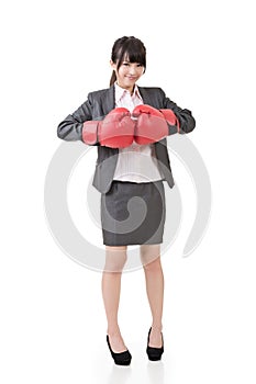 Asian business woman with boxing gloves