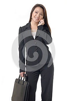 Asian business woman on cell phone