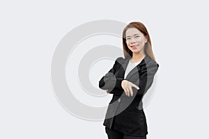 Asian business woman Crossed arms with long hair in black suit isolated on white color background