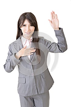 Asian business woman give you a gesture of swear