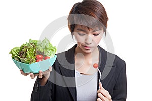 Asian business woman hate salad.