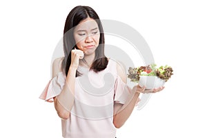 Asian business woman hate salad.