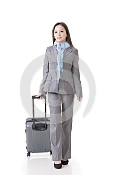 Asian business woman holding a suitcase