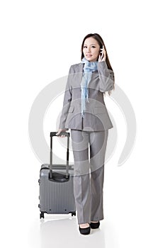 Asian business woman holding a suitcase